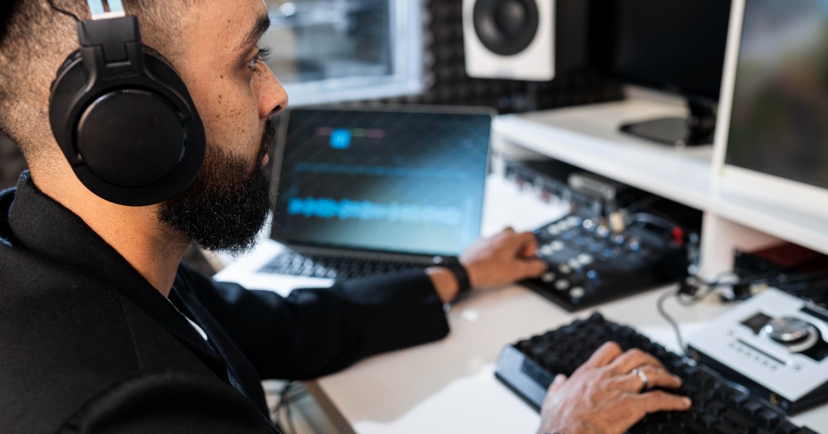 young man working radio station indoors